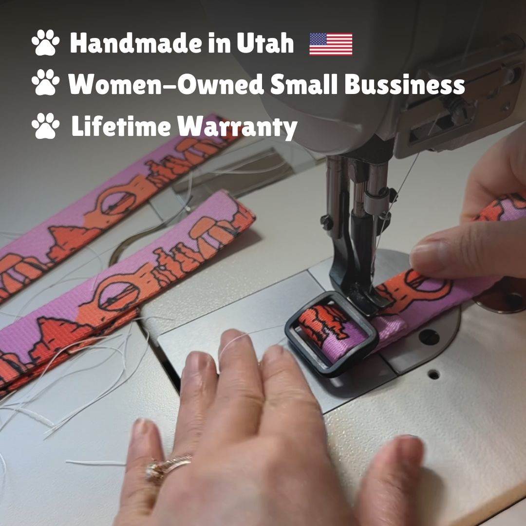 Person using a sewing machine to work on a pink and orange strap with text about handmade products in Utah, women-owned business, and lifetime warranty.