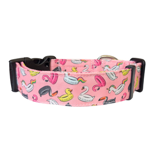 Pink dog collar with colorful pool floaties pattern on a white background