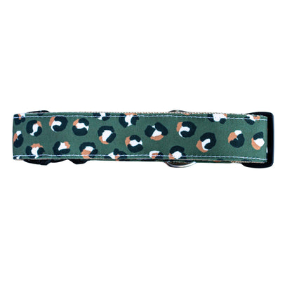 Dog collar with leopard print pattern on a green background