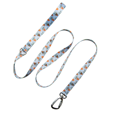 A blue pet leash with a reindeer pattern and a metal handle.