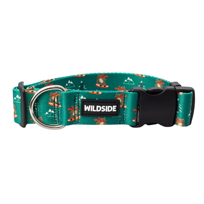 A dog collar with a green floral pattern and a black plastic buckle, featuring the brand 'Wildside' on the buckle.